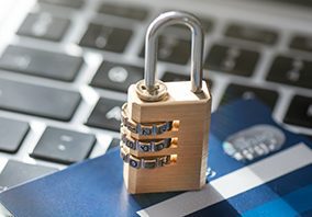 padlock on top of a laptop - 
data collection and privacy protection 